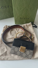 Load and play video in Gallery viewer, Gucci Supreme Monogram Calfskin Mini Padlock Top Handle Belt Bag
